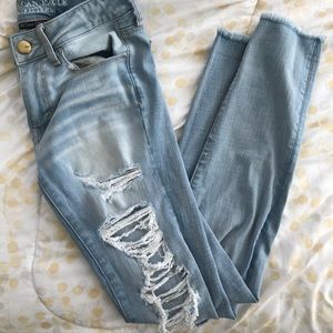 Light Wash American Eagle Ripped Skinny Jeans